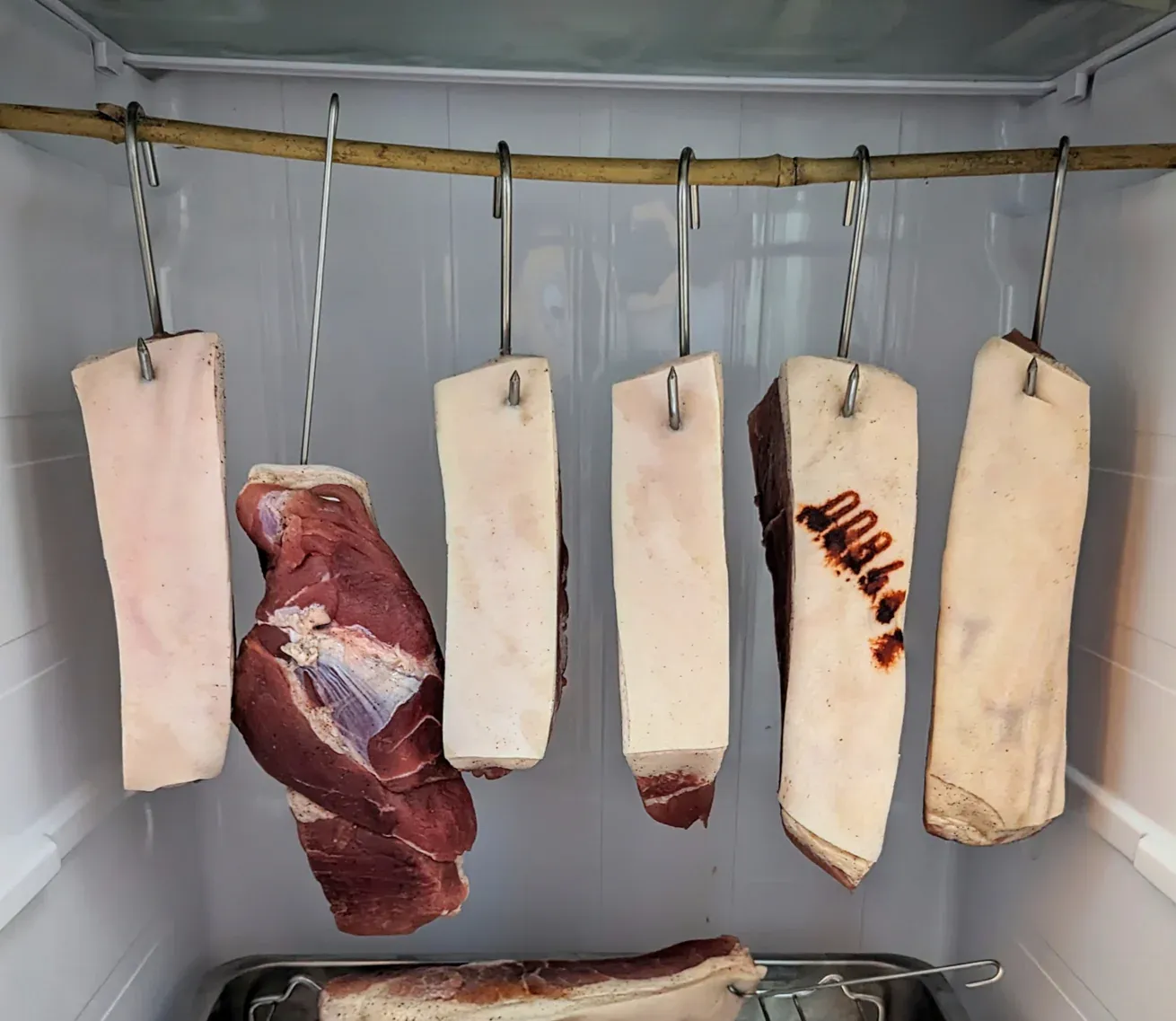 meat drying in the fridge