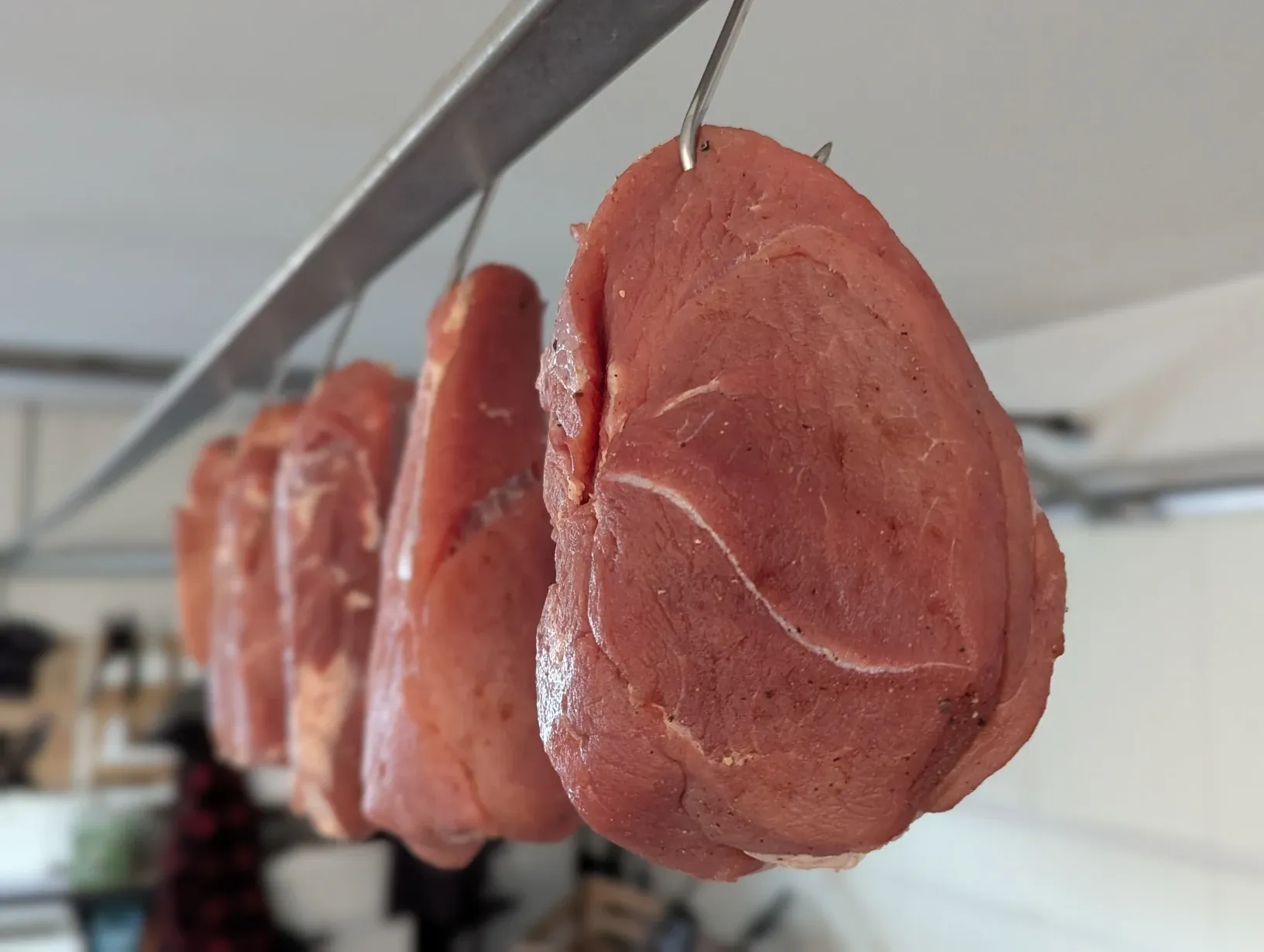 Cured meat hanging to try