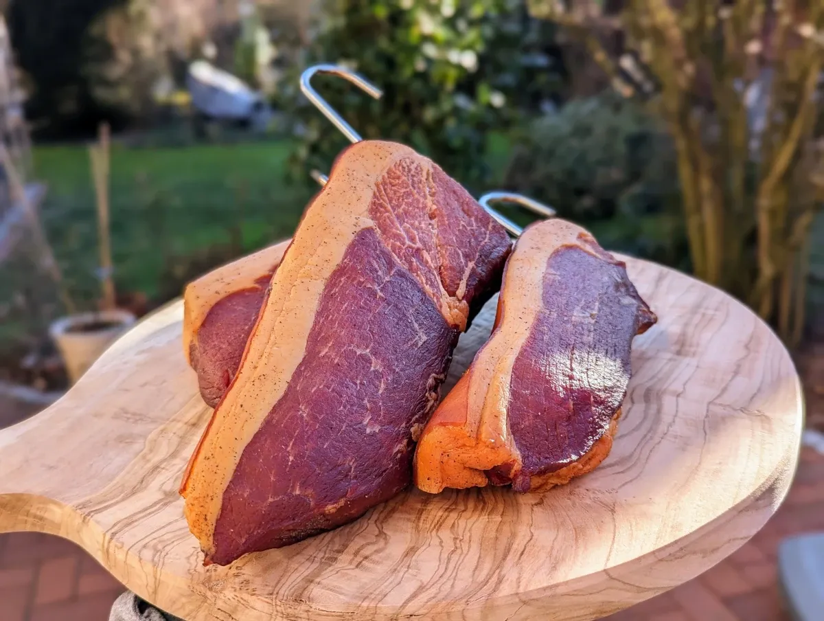 Ham on a wooden plate