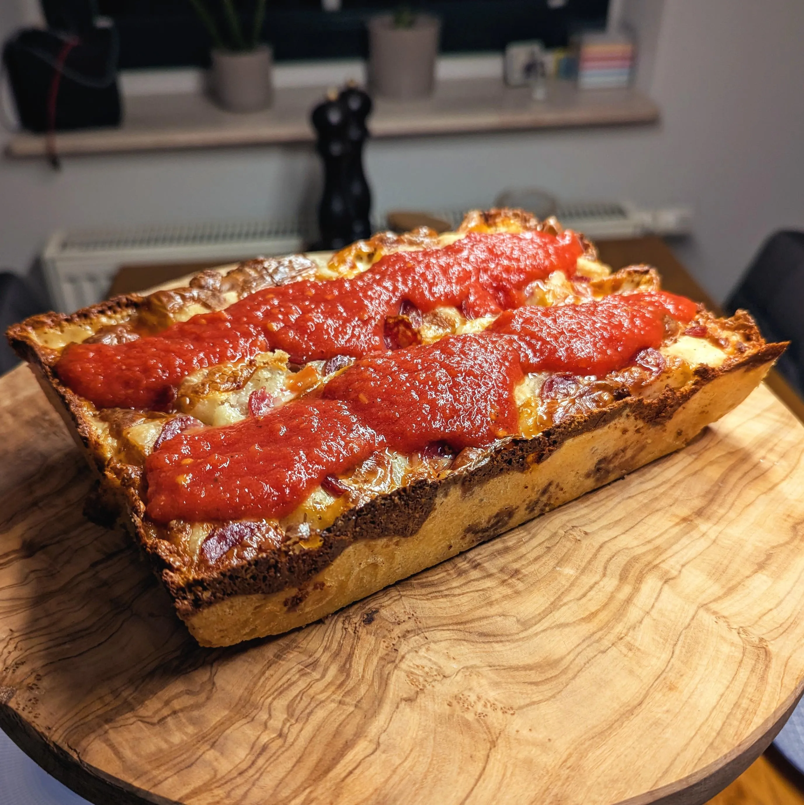 Pan pizza with salami.